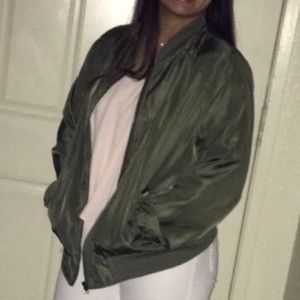an army green bomber jacket